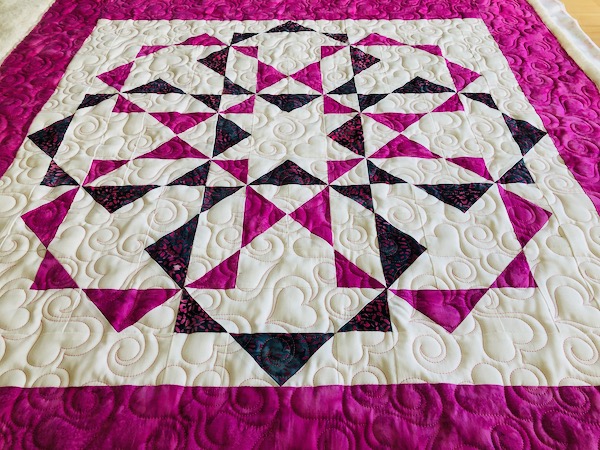 Hearts and ribbons edge to edge quilting design
